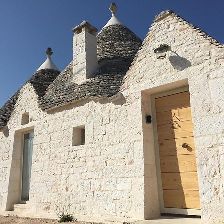 Trulli Le 2 Nicchie Villa โลโกโรตอนโด ภายนอก รูปภาพ