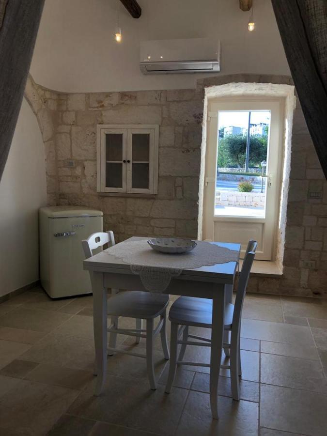 Trulli Le 2 Nicchie Villa โลโกโรตอนโด ภายนอก รูปภาพ