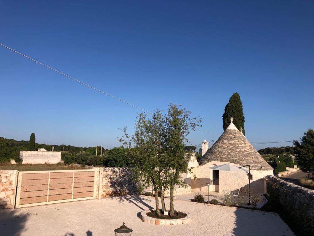 Trulli Le 2 Nicchie Villa โลโกโรตอนโด ภายนอก รูปภาพ