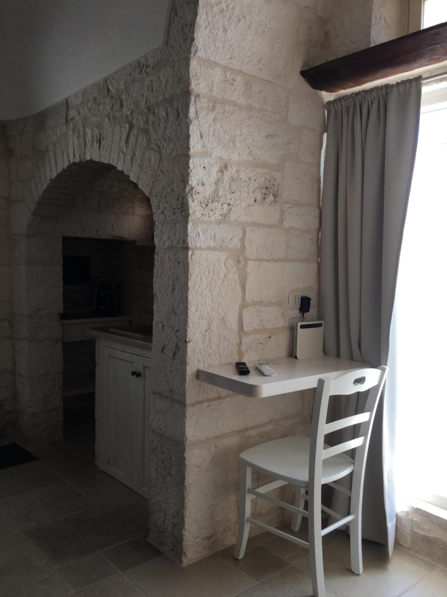 Trulli Le 2 Nicchie Villa โลโกโรตอนโด ภายนอก รูปภาพ