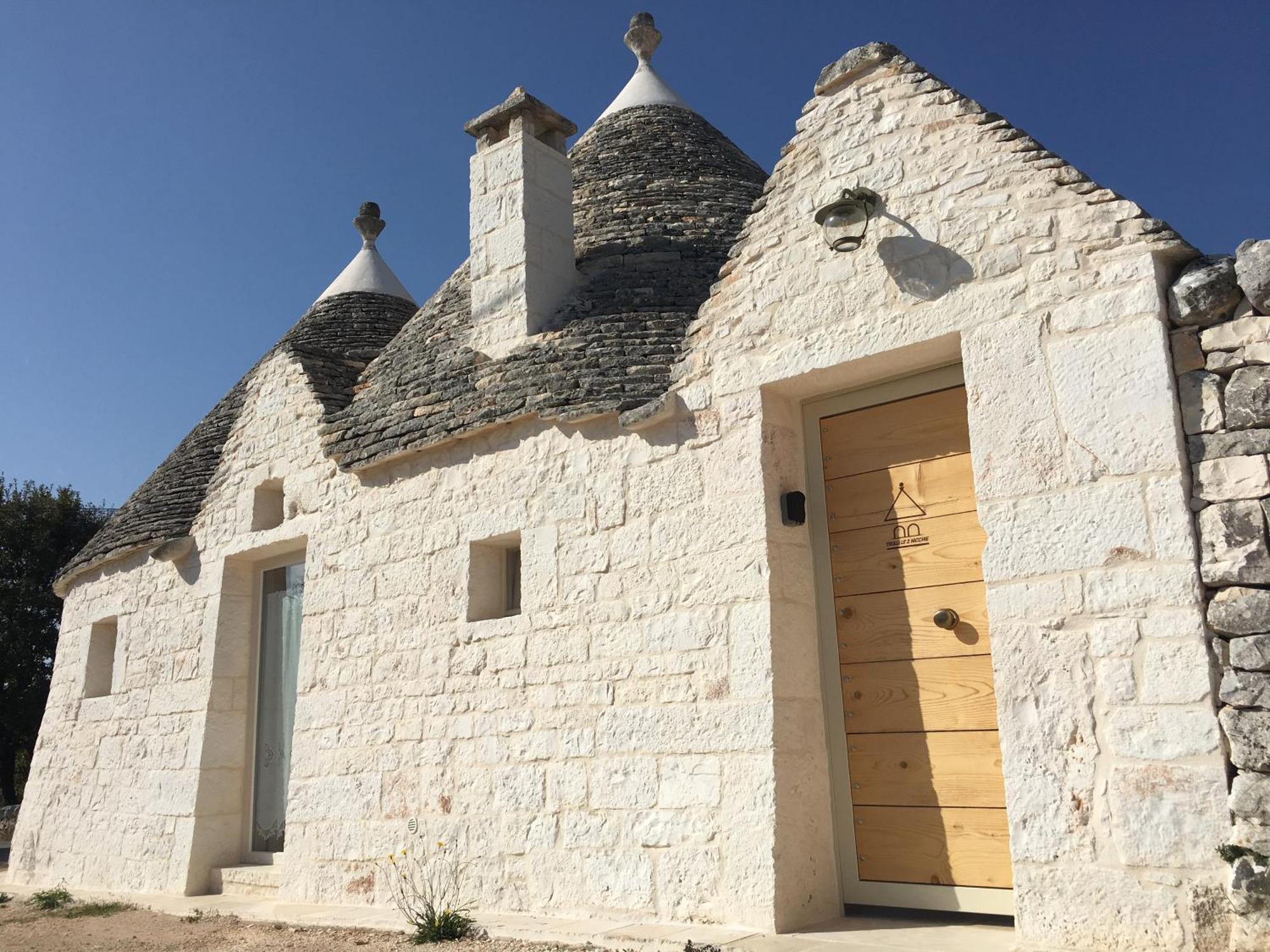 Trulli Le 2 Nicchie Villa โลโกโรตอนโด ภายนอก รูปภาพ